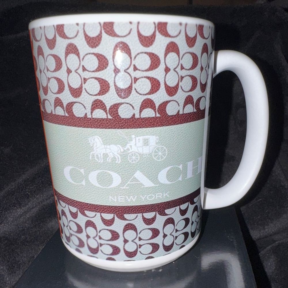 Coach Ceramic Mug with Brown Signature Pattern & Mint Band

(Fashion)